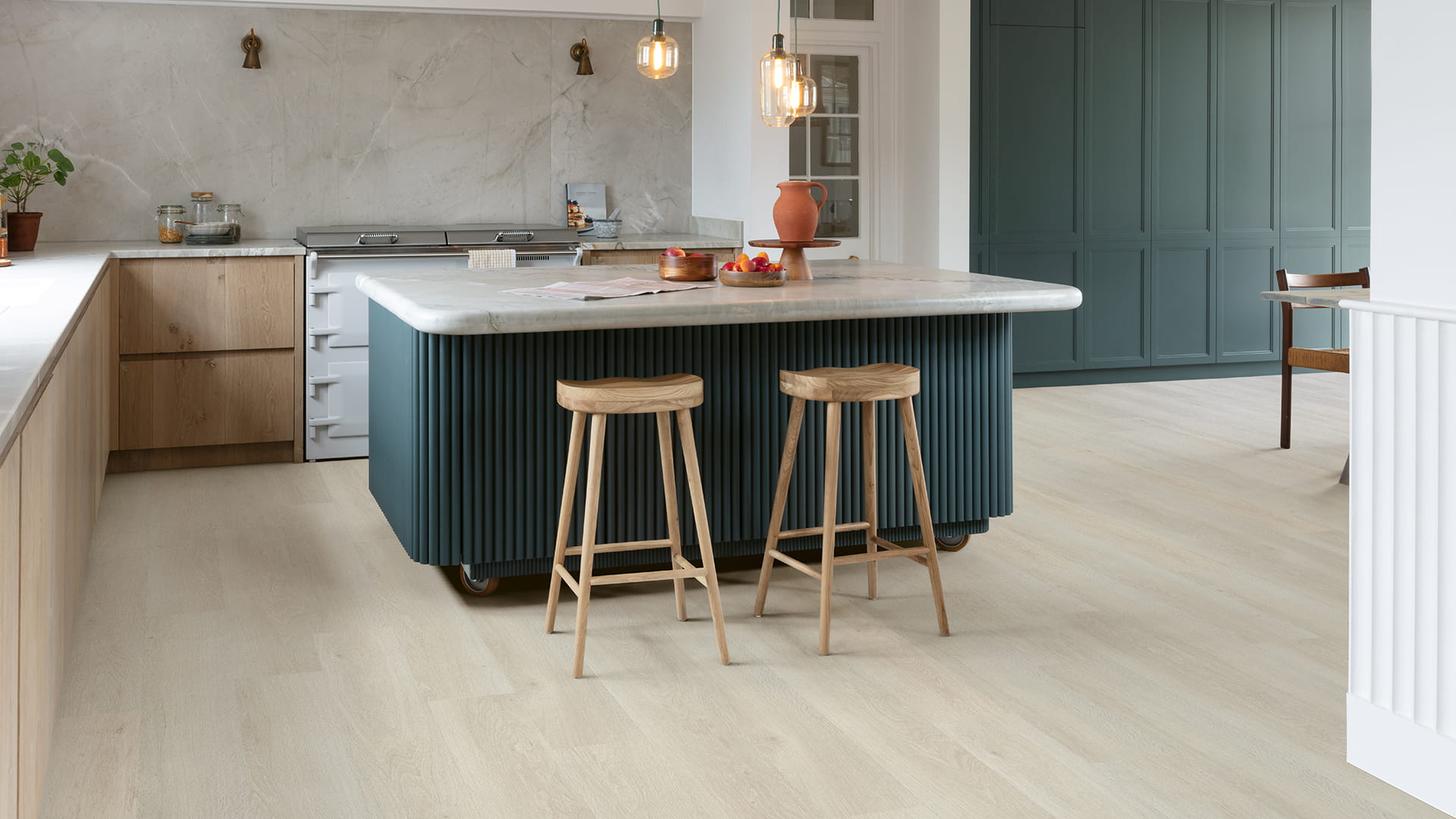 Kitchen with grey vinyl plank flooring